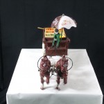 Original newer cast iron horse drawn fruits and vegetables cart